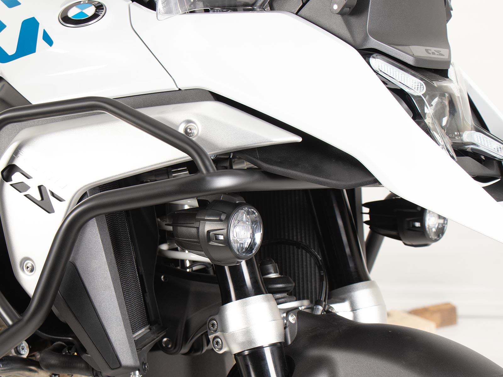 Carrier for original BMW R 1300GS (2023-) fog lights for combination with Hepco&Becker tank guard